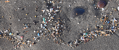 Small pieces of plastic on a beach